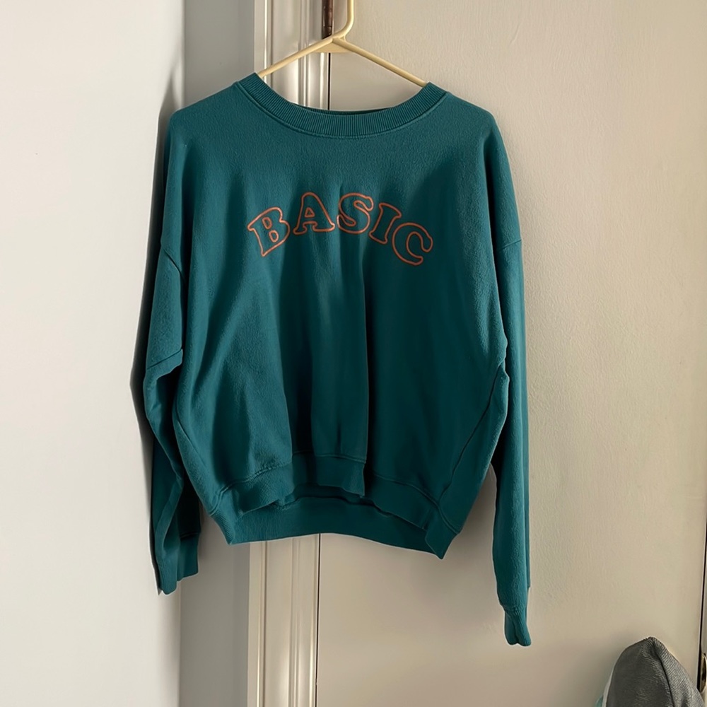 Teal “Basic” crewneck. Size - Medium. Worn a lot but still good condition.